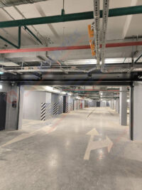 Секционные противопожарные ворота FireTechnics-S EI60 без калитки в паркинге ЖК